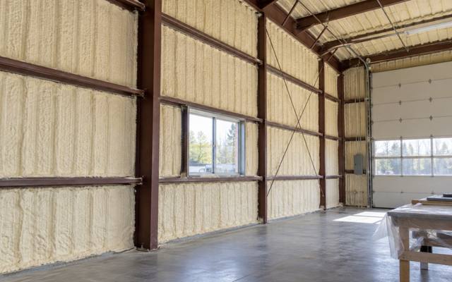 Industrial workshop with spray foam on the walls and roof in Waterloo